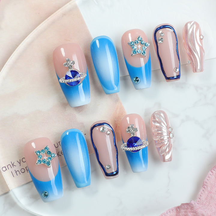 Elegant artificial nail set with delicate ombre effects and sparkling details Bowlift