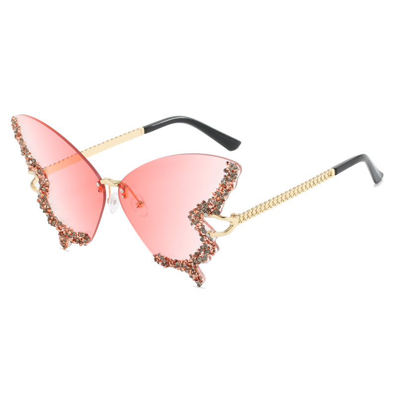 Ladies extravagant Cats Eye sunglasses with sparkling accents Bowlift