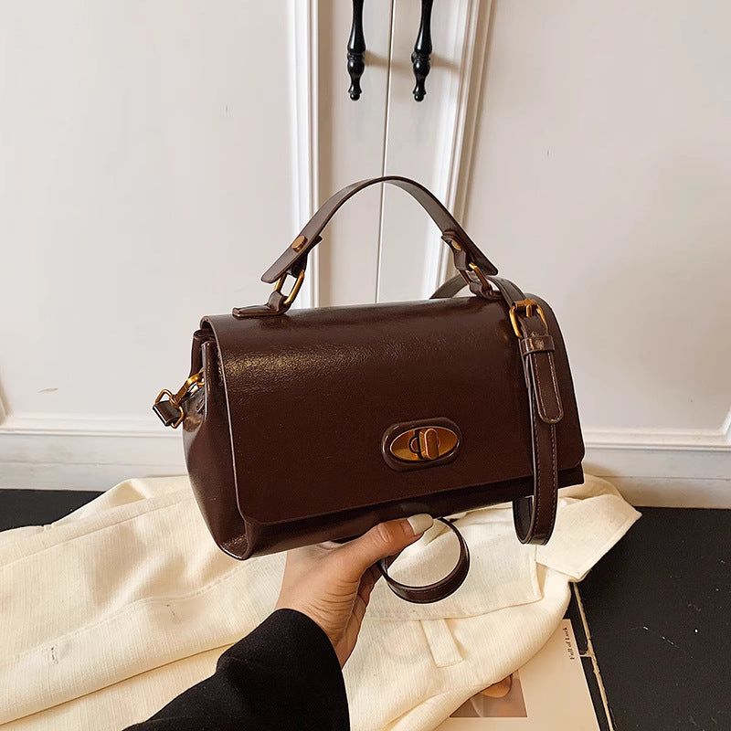 Elegant Structured Handheld Purse Bowlift