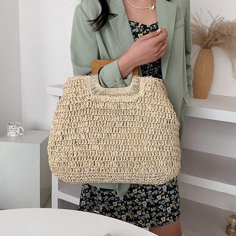 Designer handbag with practical wooden handle Bowlift