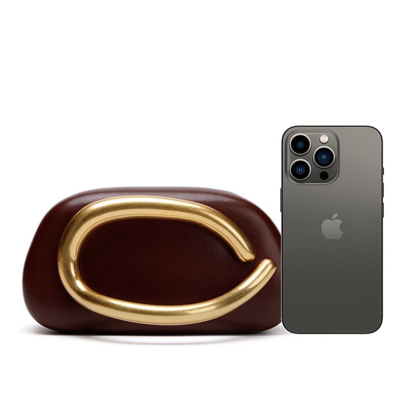 Statement Clutch with Sculptural Handle Bowlift