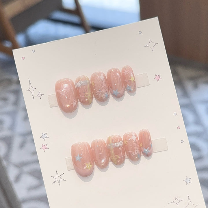 Artificial nails with romantic star and glitter motifs Bowlift