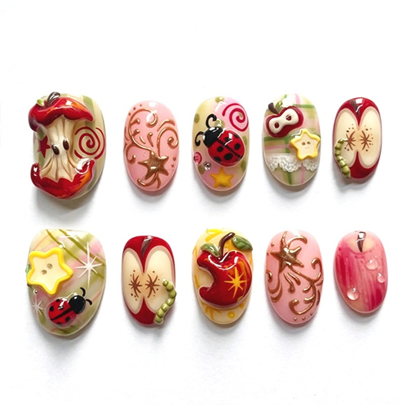 Creative nail art set with playful designs and glitter accents Bowlift