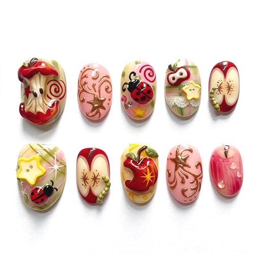 Creative nail art set with playful designs and glitter accents Bowlift