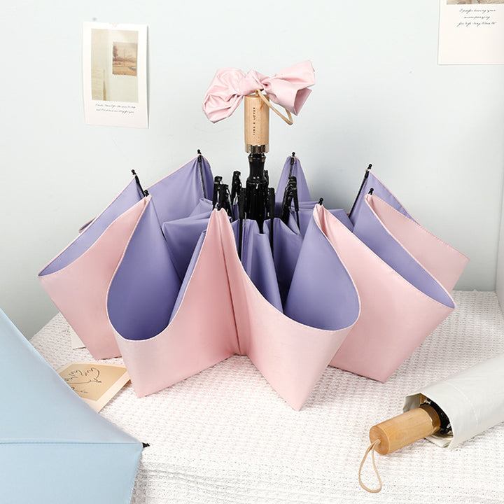 Ladies stylish handheld umbrella with decorative design Bowlift