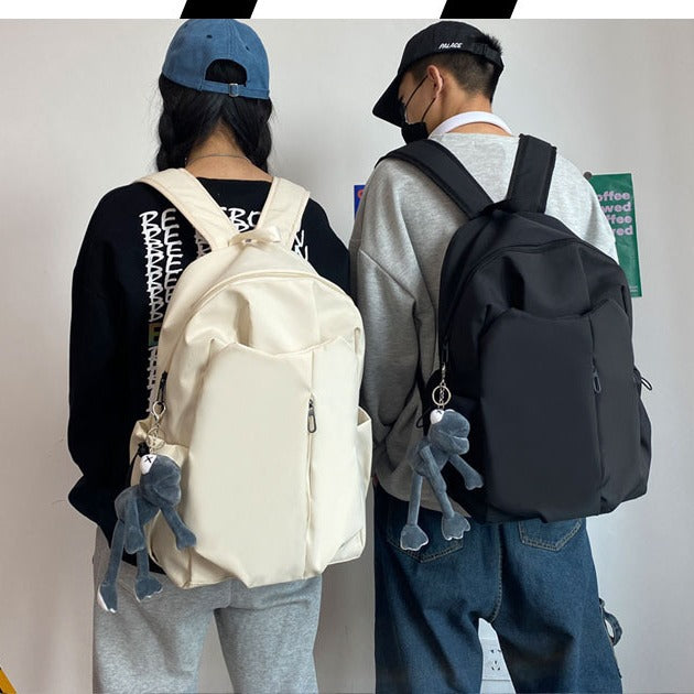 Backpack with Versatile Compartments and Charming Pendant Bowlift