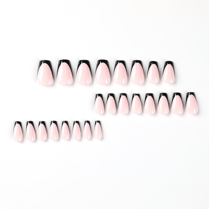 Elegant stiletto nails with contrasting French tip Bowlift