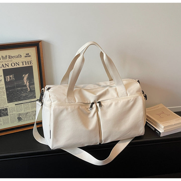 Sporty travel bag with expandable compartments Bowlift