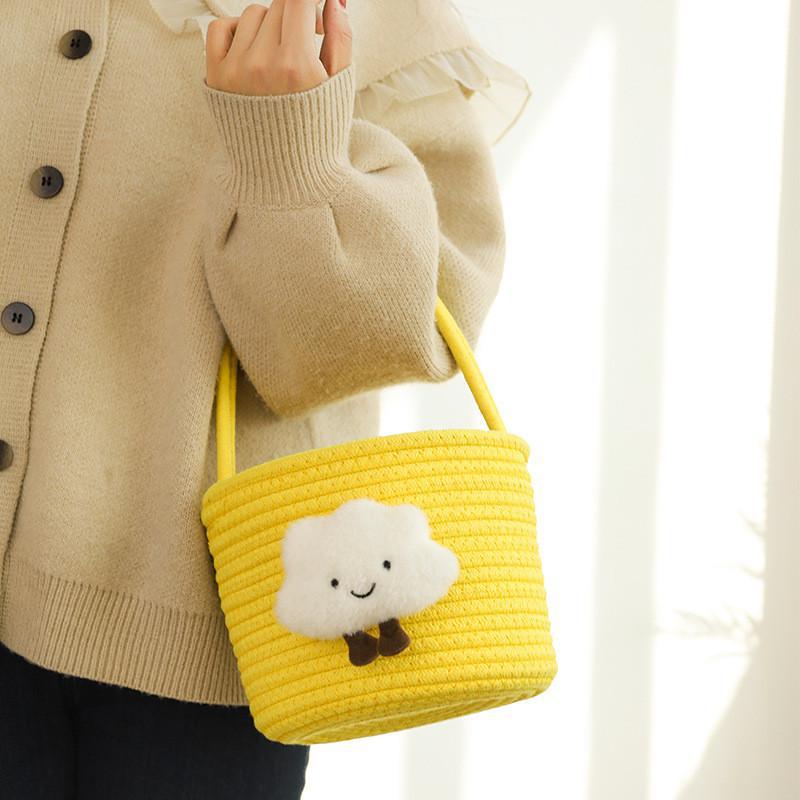 Storage basket with playful cloud motif