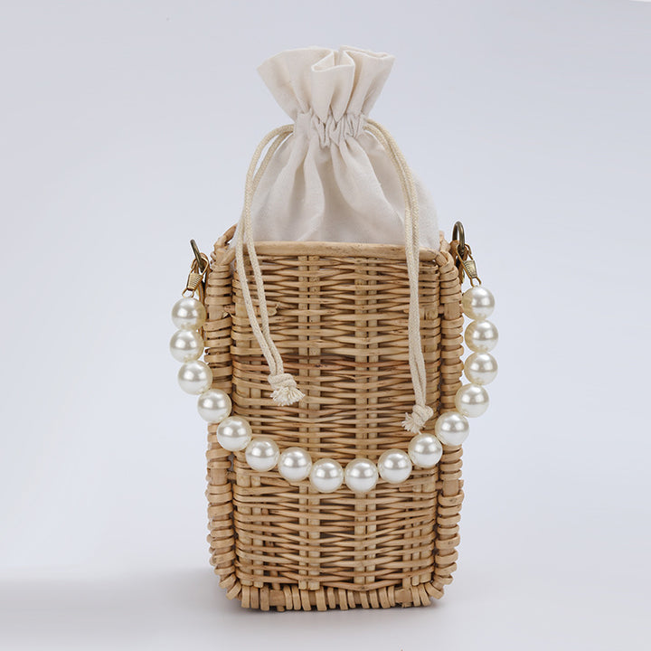 Women's handbag made of woven material with pearl accents Bowlift