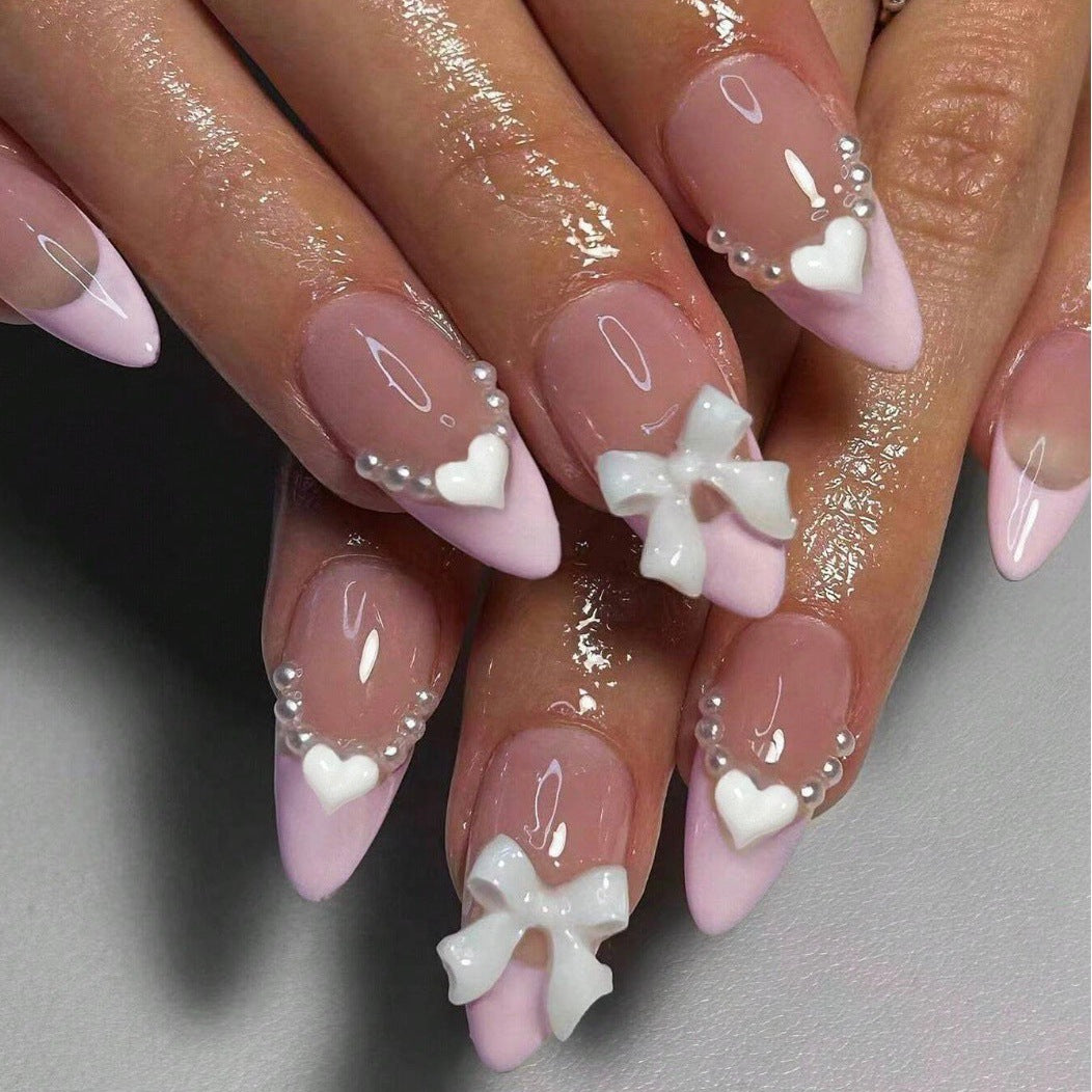 Artificial nail tips with heart and bow decorations Bowlift
