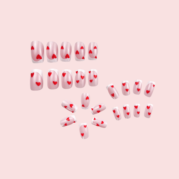 Heart-Embellished French Tip Nail Art Bowlift
