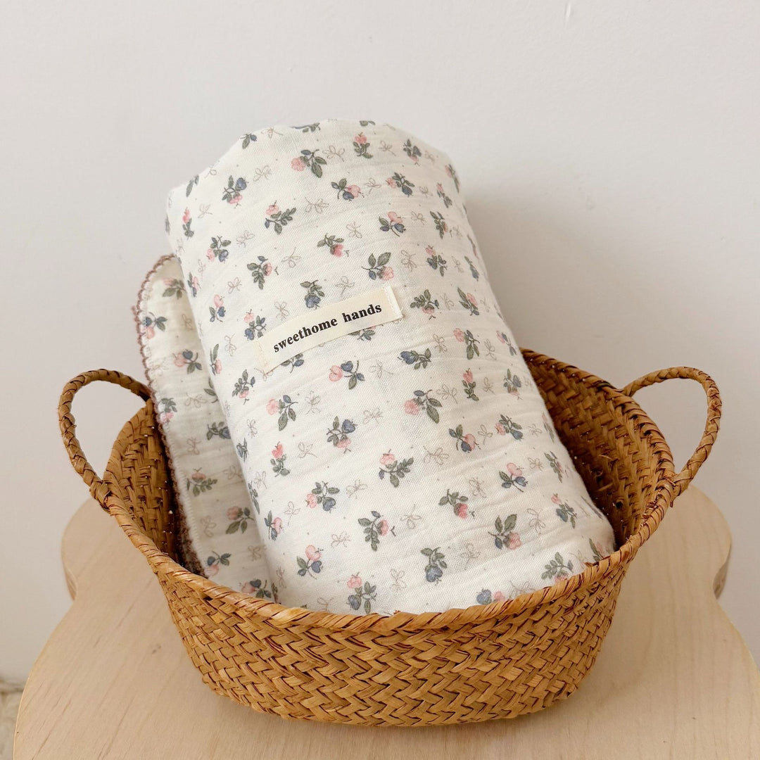 Unisex Muslin Blanket with delicate floral design and elegant ruffles Bowlift