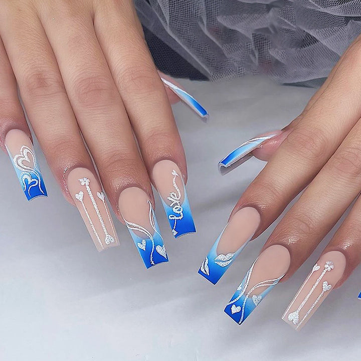 Creative nail art set with elegant heart and gradient patterns Bowlift