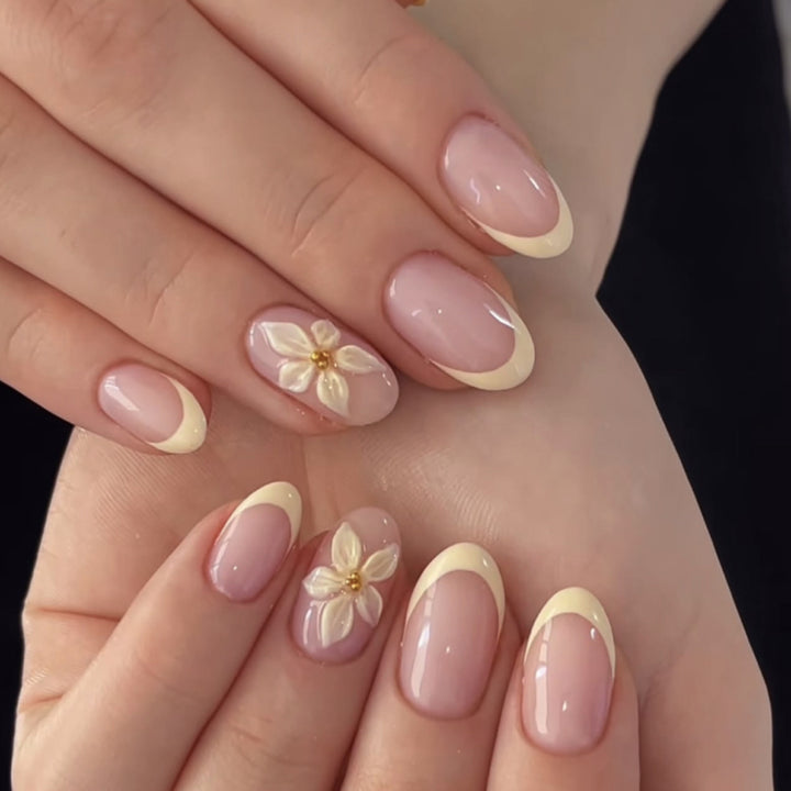 Artful stiletto nails with elegant floral design and glitter details Bowlift