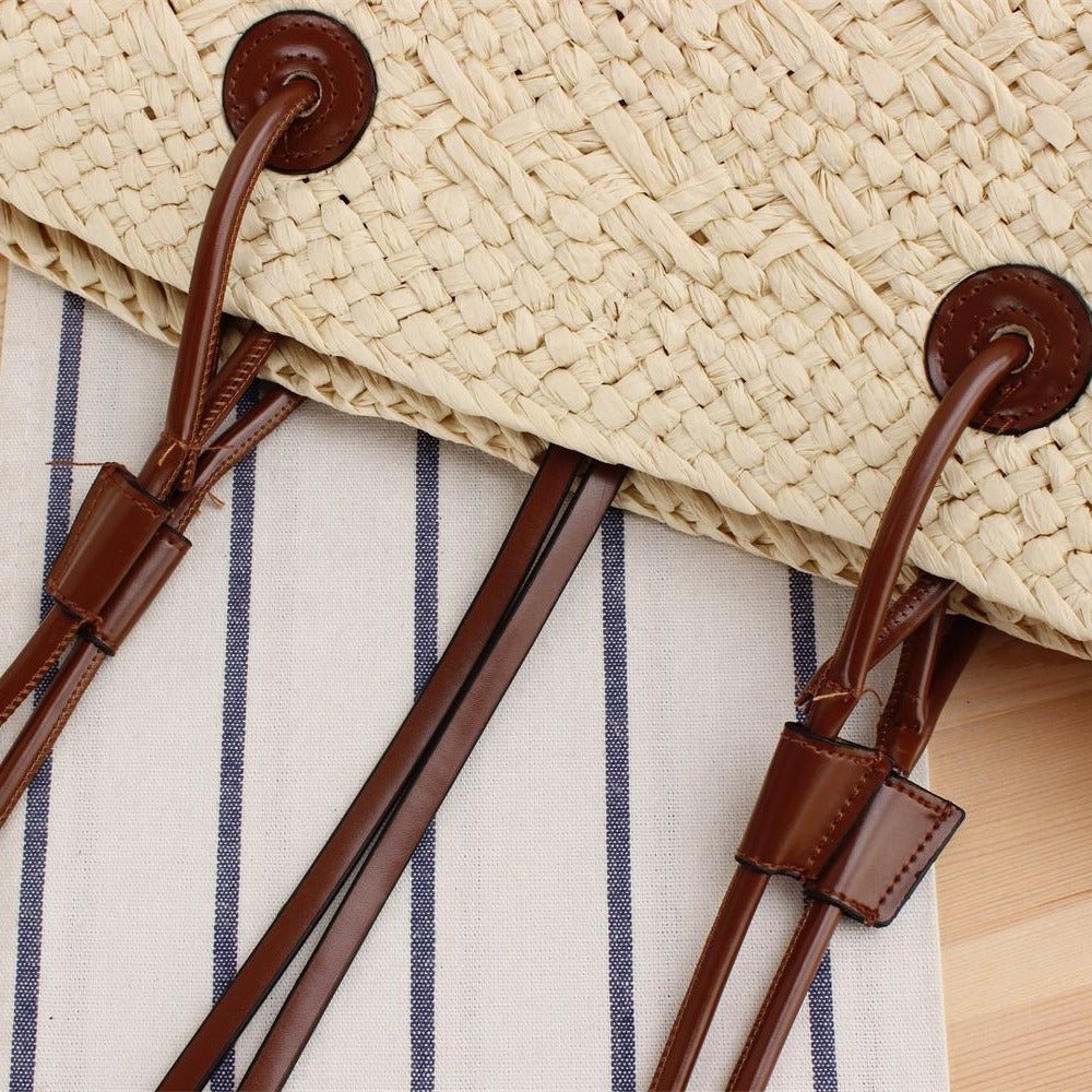 Beach bag made of high-quality braided straw with stylish leather handles Bowlift
