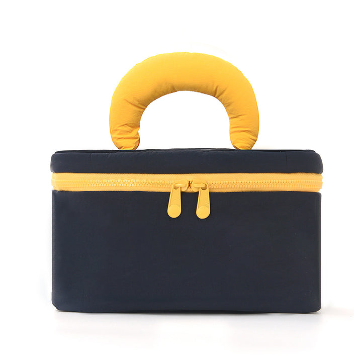 Cosmetic organizer with ergonomic carrying handle Bowlift