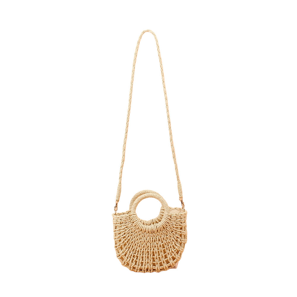 Shoulder bag made of woven natural material with round opening Bowlift