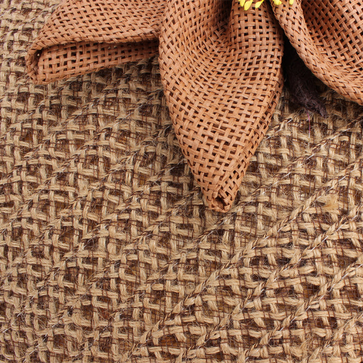 Handbag with floral appliqué Made of natural material Bowlift