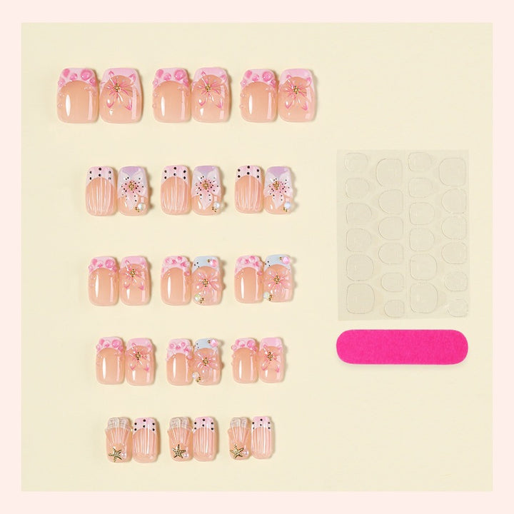 Artificial nail set with floral accents and glamorous decorations Bowlift