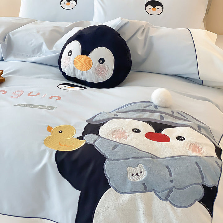 Children's bedding set with penguin appliqué and soft cotton blend