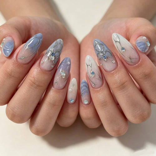 Artistic Press-On Nail Design with Floral and Gem Accents Bowlift