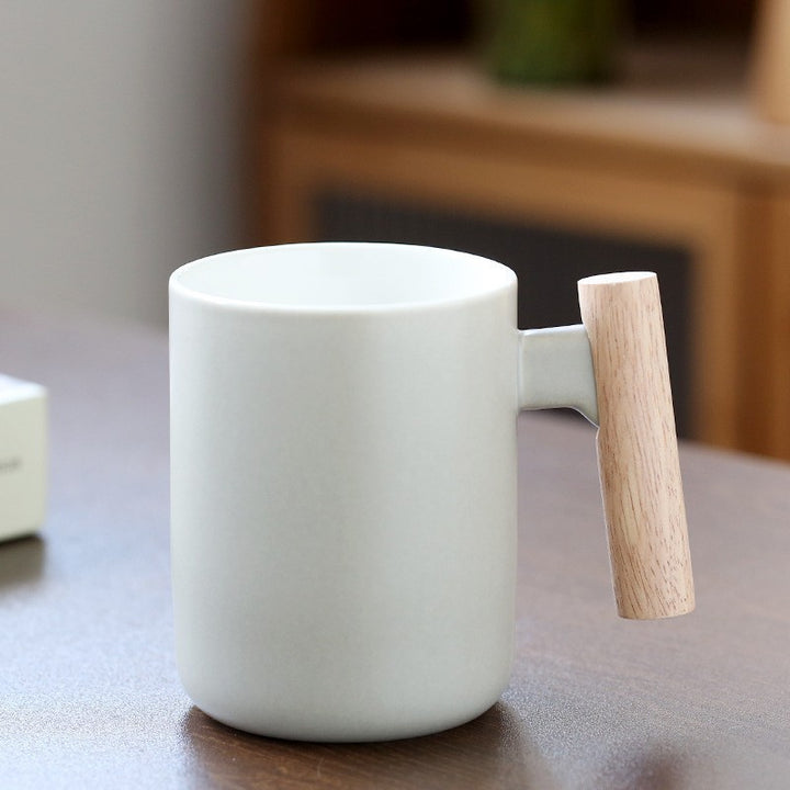 Ceramic Coffee Mug with Ergonomic Wooden Handle Bowlift