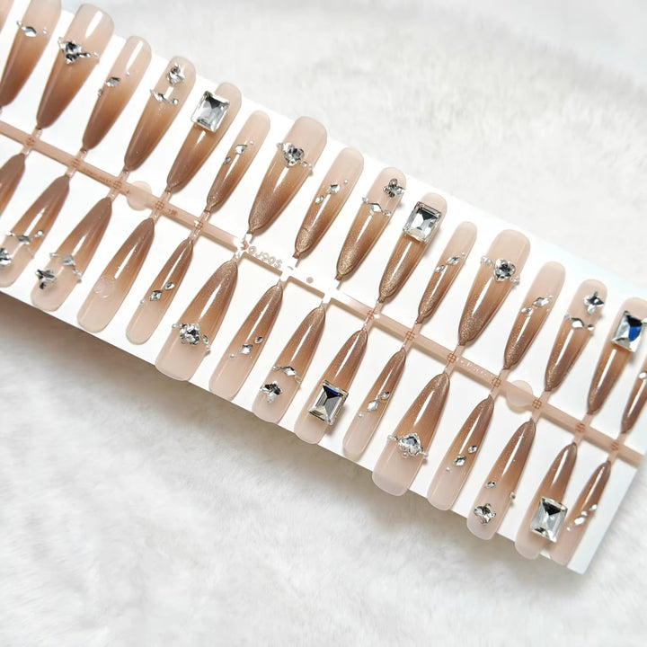 Artificial nails with sparkling rhinestone decorations Bowlift
