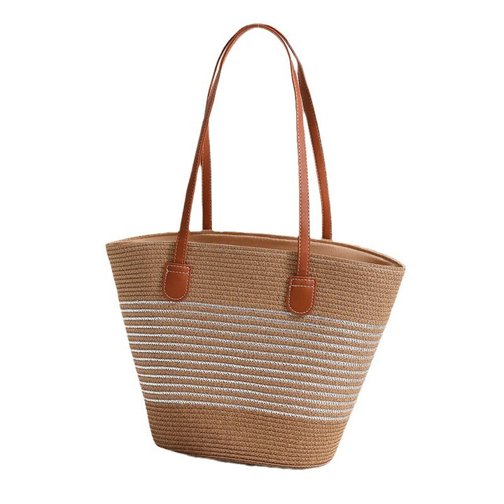 Elegant bast handbag with leather accents Bowlift