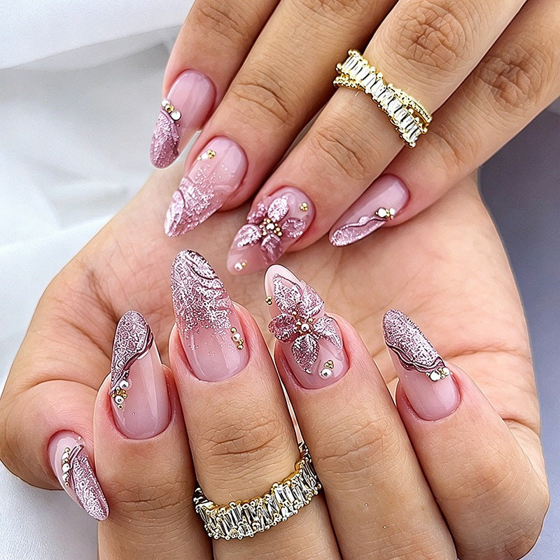 Acrylic nail set with elegant flower and glitter patterns Bowlift