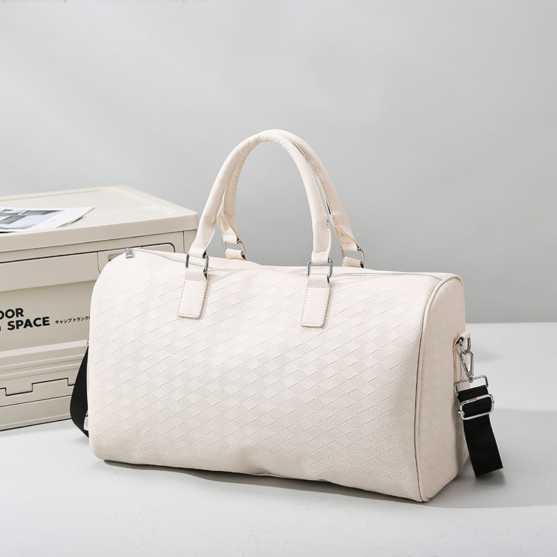 Sporty shoulder bag with structured outer material Bowlift