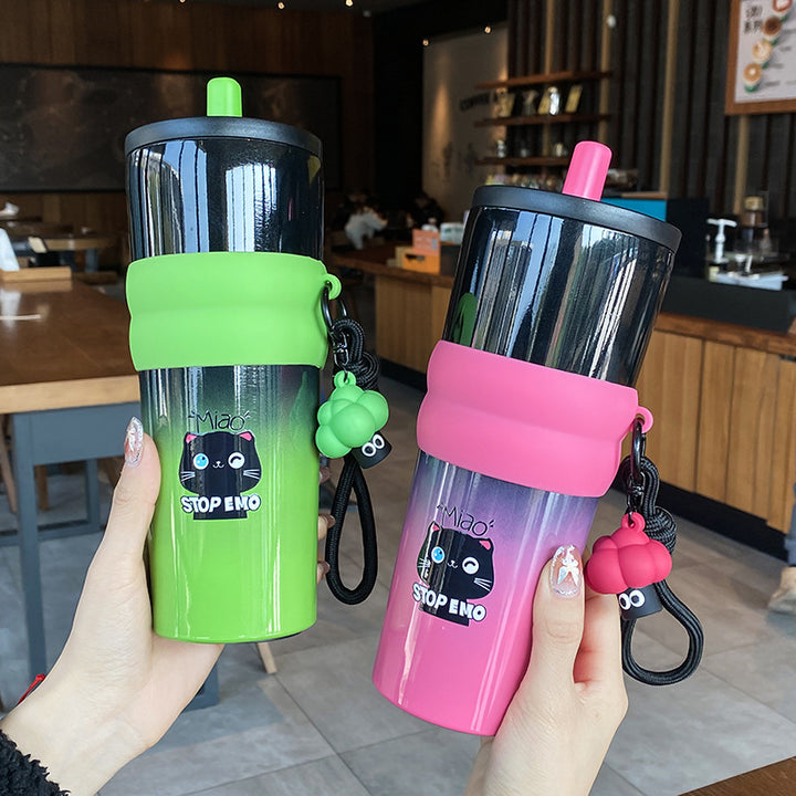 Women's playful coffee mug with silicone sleeve and integrated pendant Bowlift