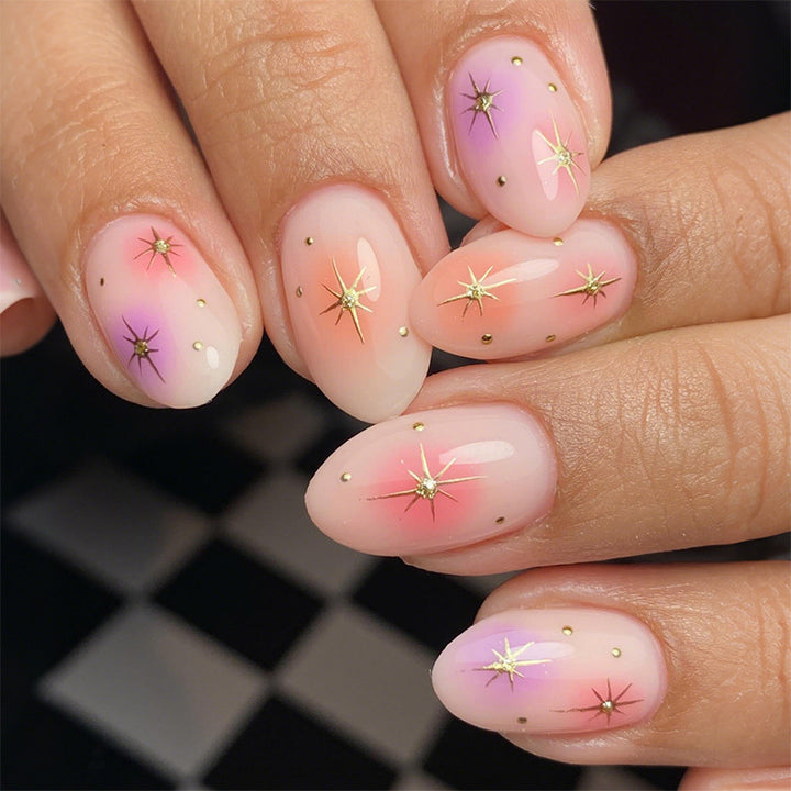 Artistic Press-On Nail Set with Vibrant Star Designs Bowlift