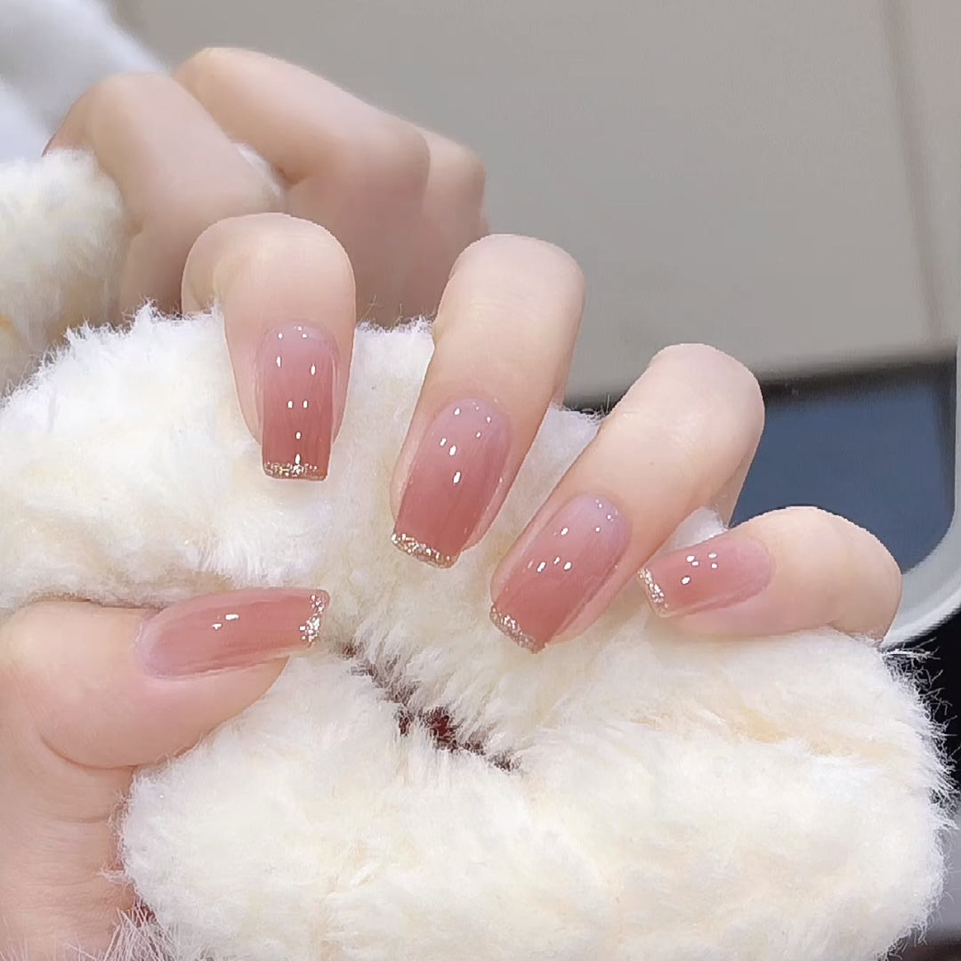 Artificial nails with heart design and glitter accents Bowlift