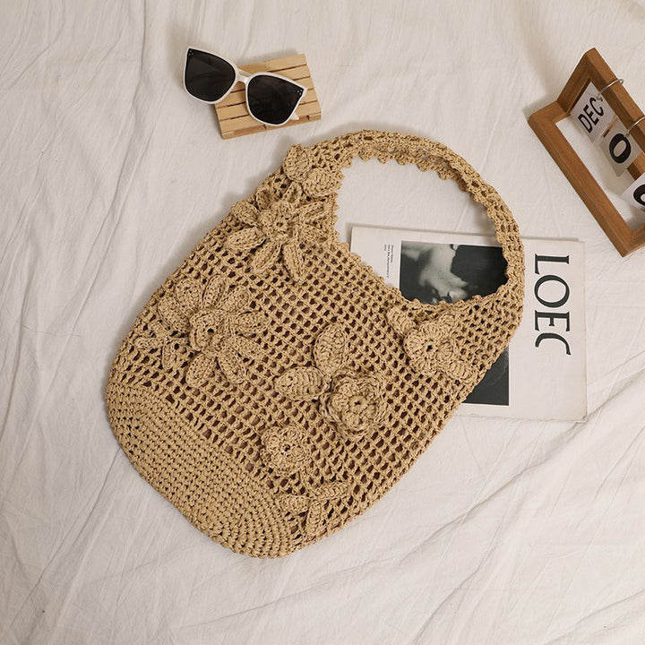 Crocheted shoulder bag with floral appliqués Bowlift