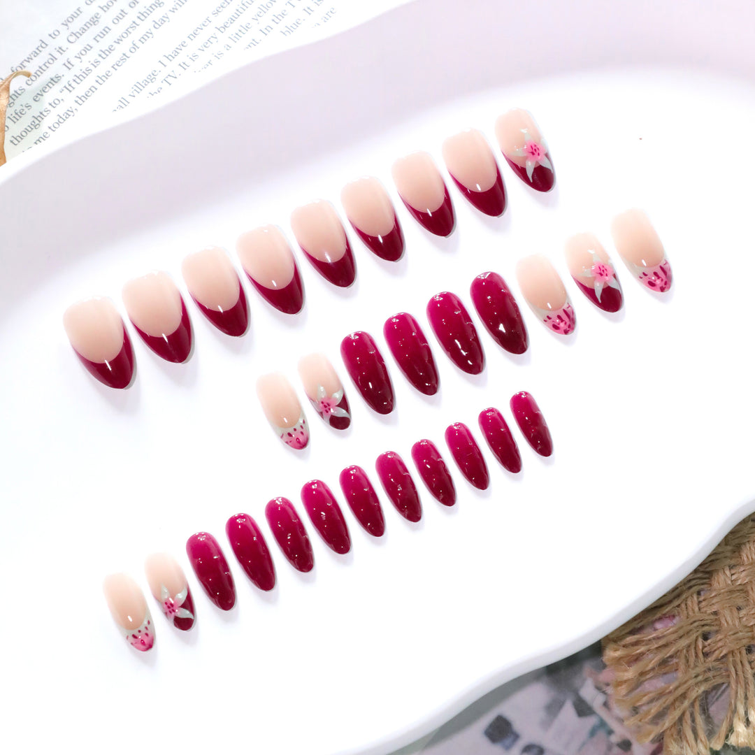 Artistic nail art with floral accents and glossy finish Bowlift