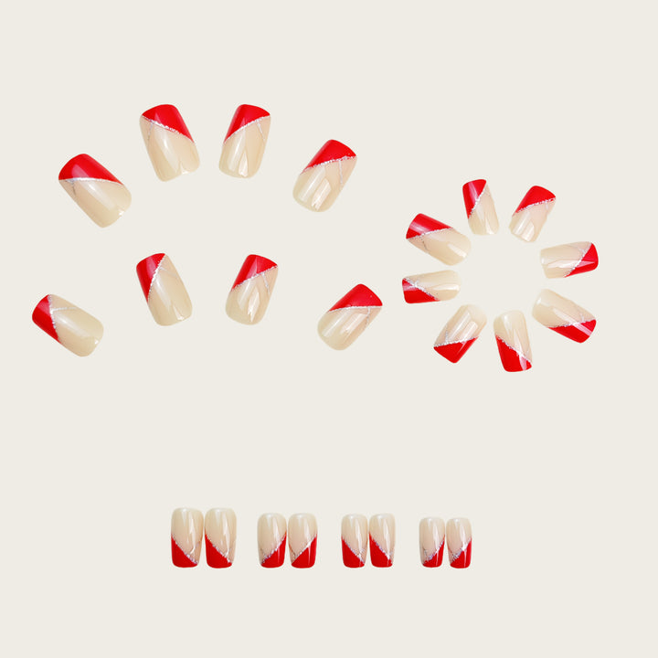 Artificial nails with luxurious gold and red accent design Bowlift
