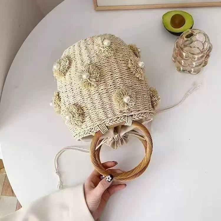 Refined handbag with pearl applications Bowlift