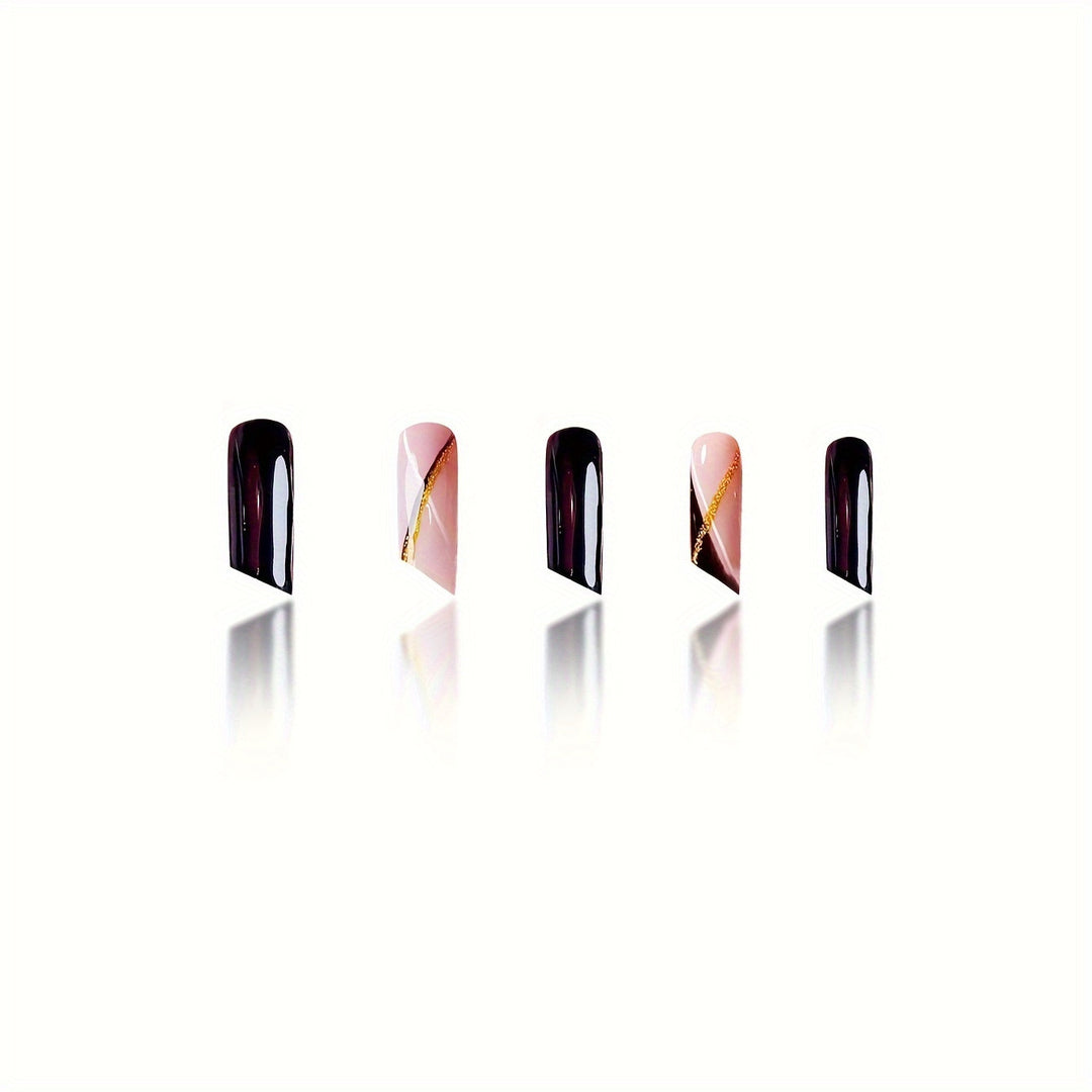 Elegant Stiletto Nail Enhancements with Golden Accents Bowlift