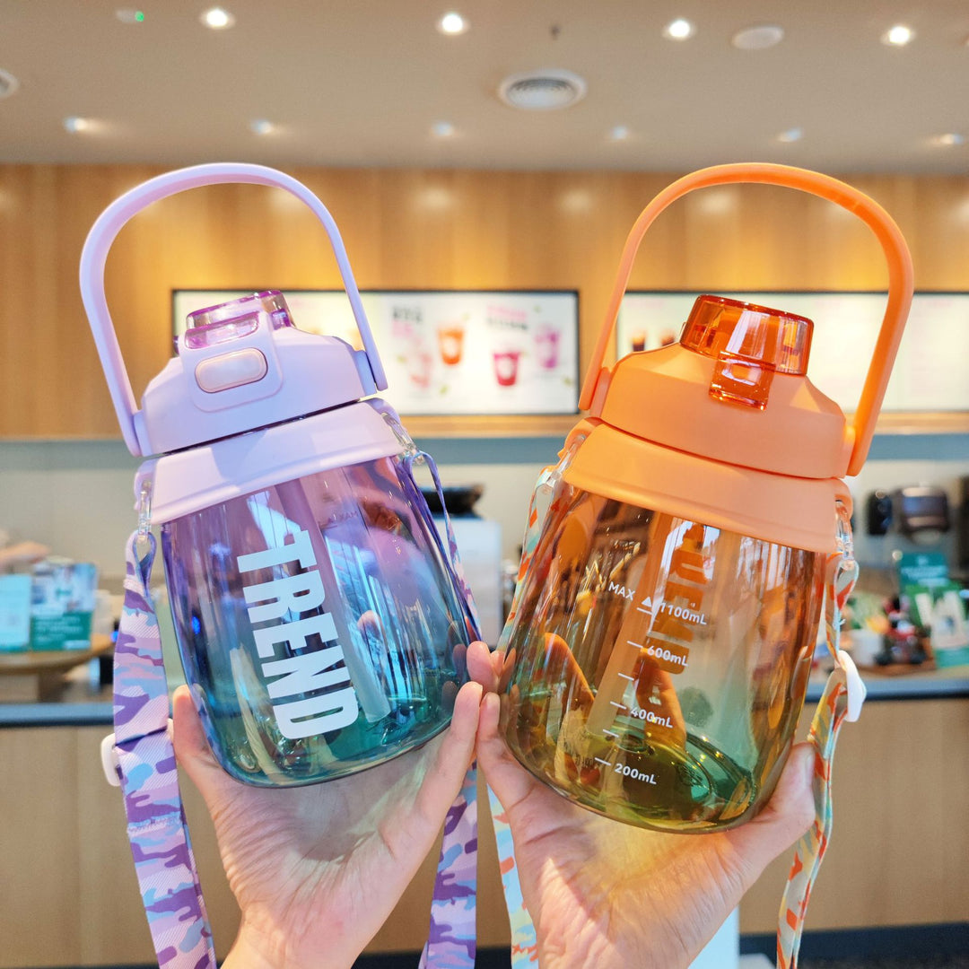 Women's multifunctional water bottle with safety closure and ergonomic carrying handle Bowlift