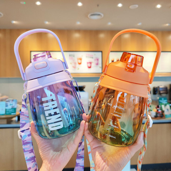 Women's multifunctional water bottle with safety closure and ergonomic carrying handle Bowlift