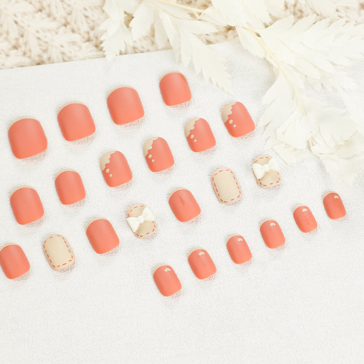 Artistic nail nails with decorative bow designs and French tips Bowlift