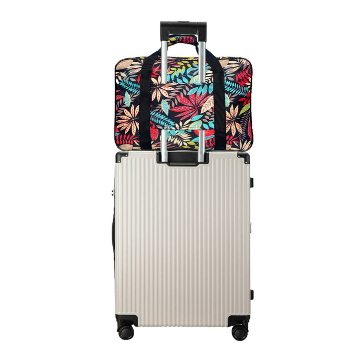Practical travel bag with petal motif Bowlift