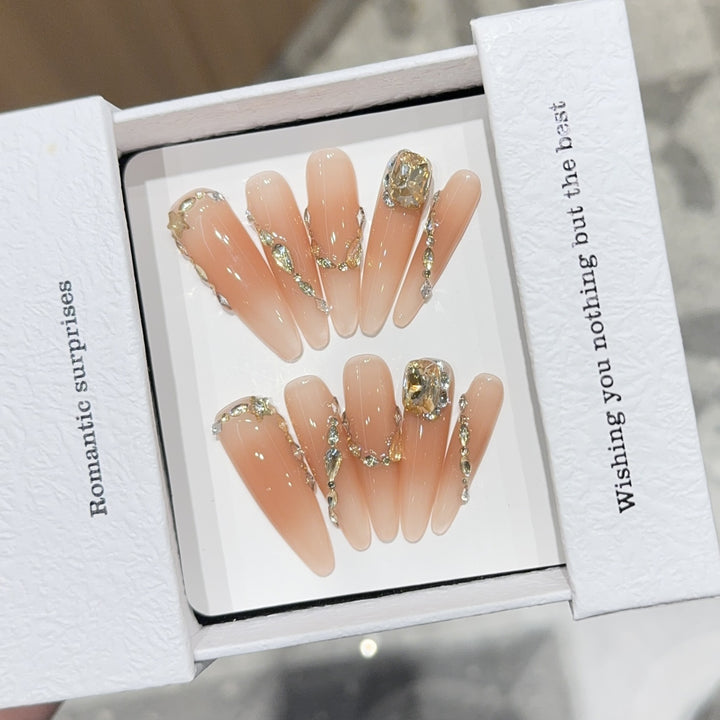 Artificial nails with Romantic Glamour Design Bowlift