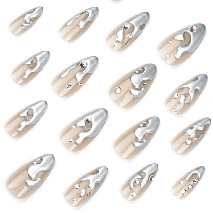 Artful artificial nails with glitter and metallic accents Bowlift