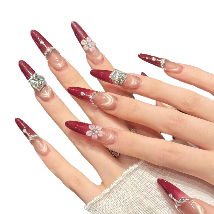 Decorative Press-On Nail Art with Gem and Floral Accents