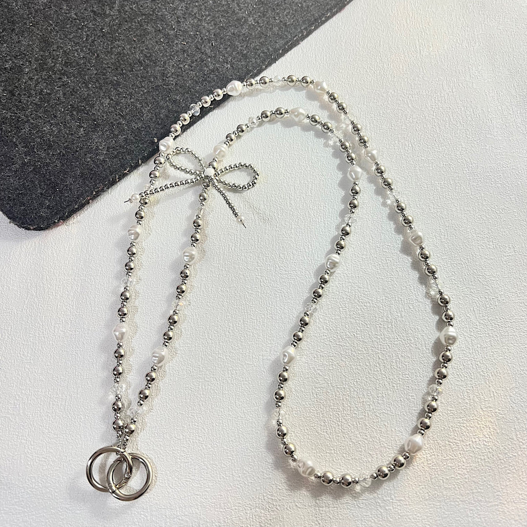 Elegant Pearl and Silver Necklace Bowlift