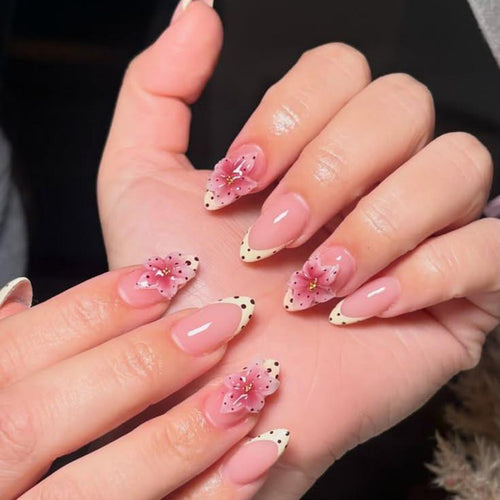 Artificial nails with floral design and elegant accents Bowlift