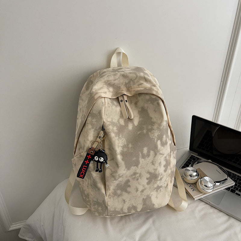 Fashionable backpack with practical design and decorative pendant Bowlift