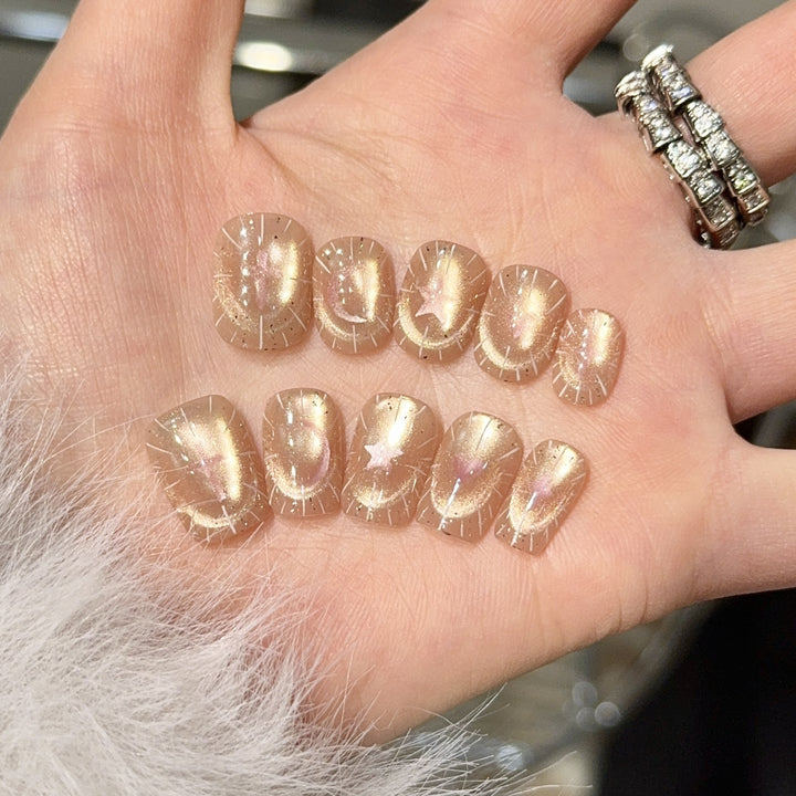 Shiny artificial nail tips with romantic shimmer Bowlift